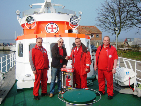 Bei der Übergabe des Kompressors v.l.: Dirk Göttsch, Rolf Brinkmann, Michael Müller und Andreas Blöder.